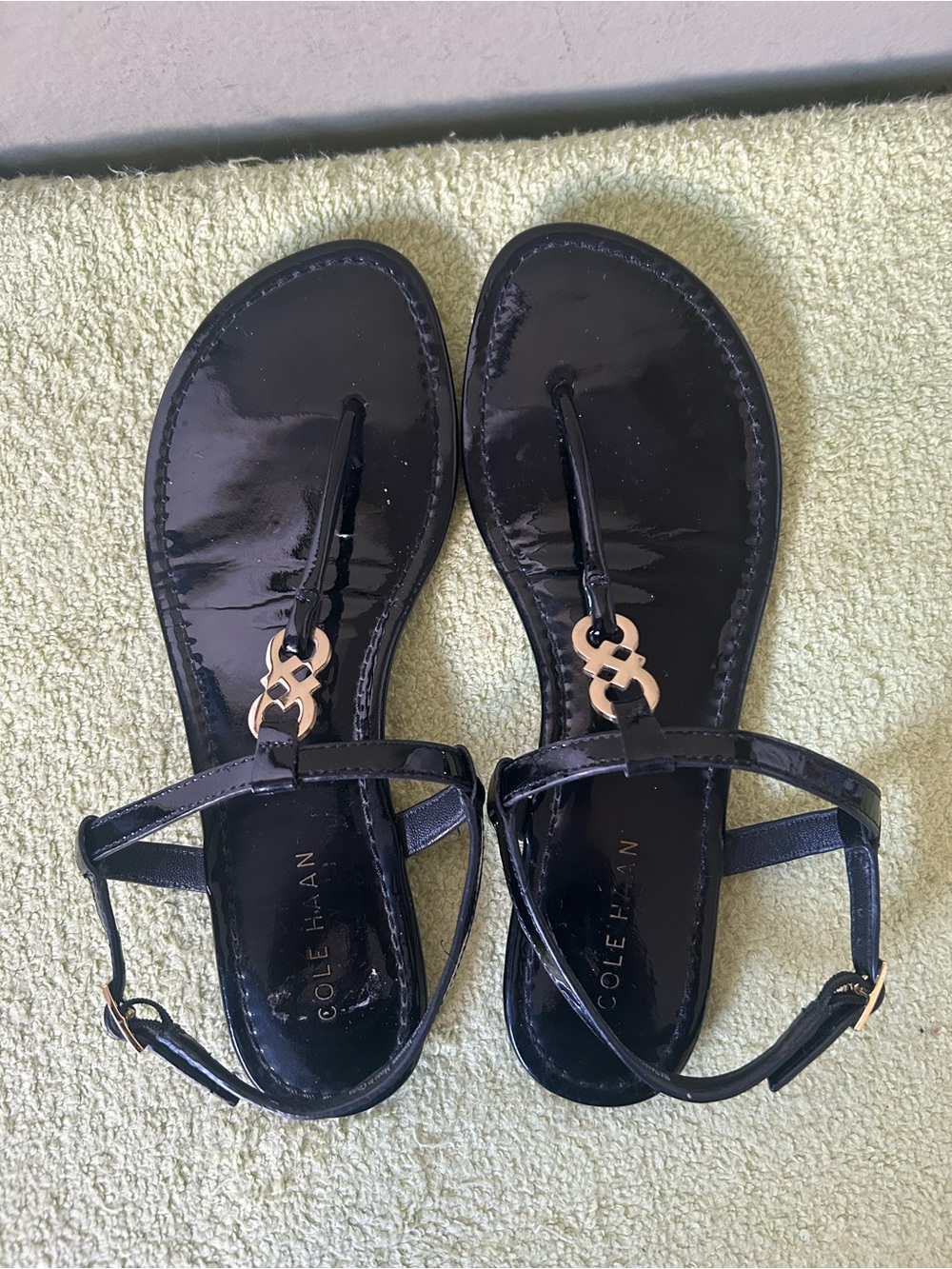 Cole Haan Black Patent Leather T-Strap Sandals with Gold Accent